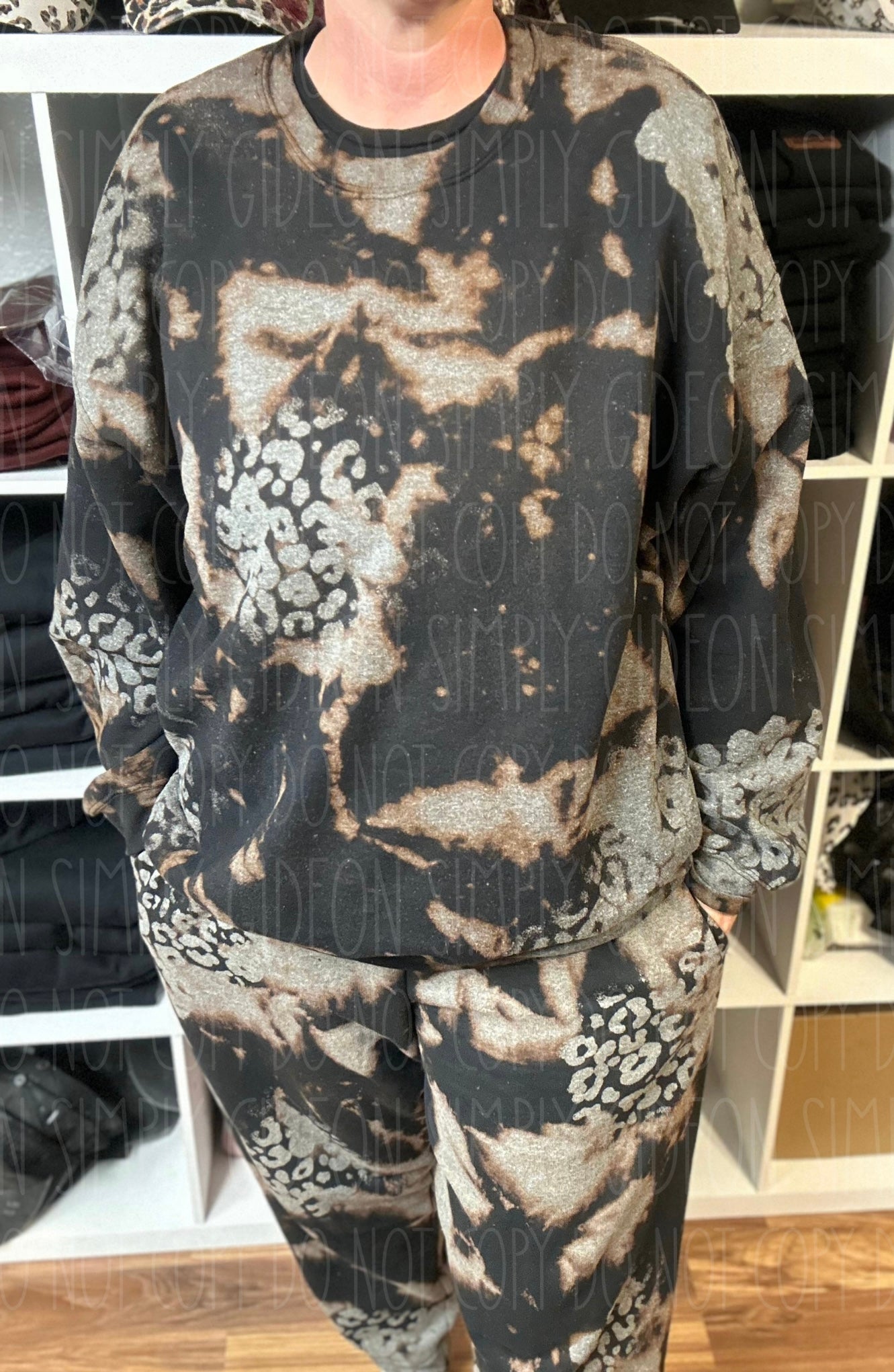 A black and grey acid wash with leopard print sweatpants and crewneck